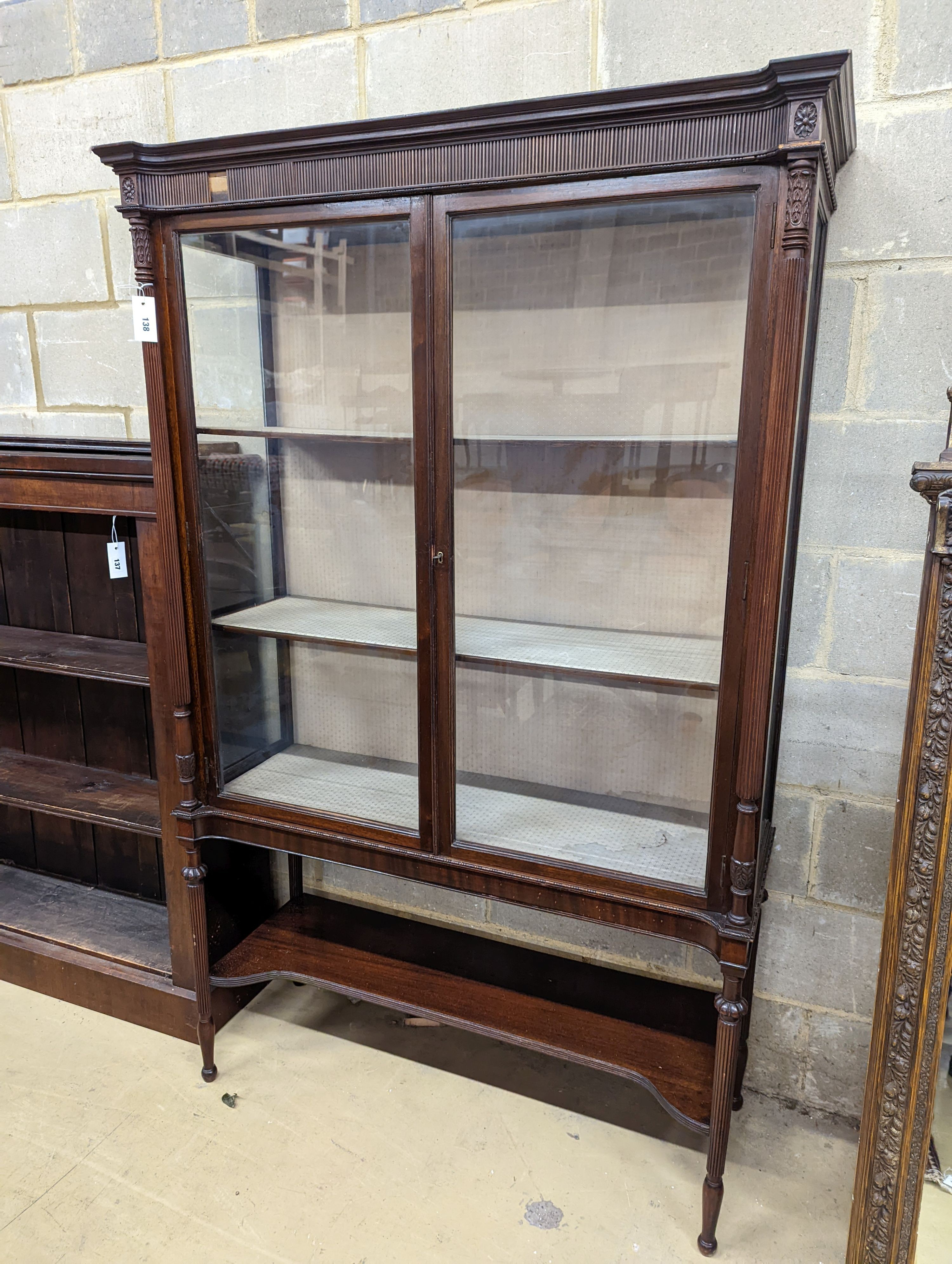 An Edwardian mahogany display cabinet, length 112cm, depth 44cm, height 177cm